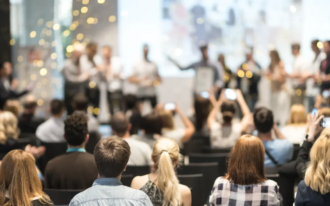 Young business team receiving award prize