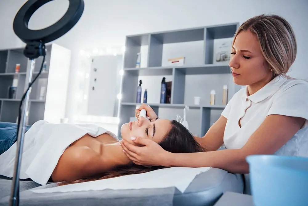 medspa esthetician working on patient